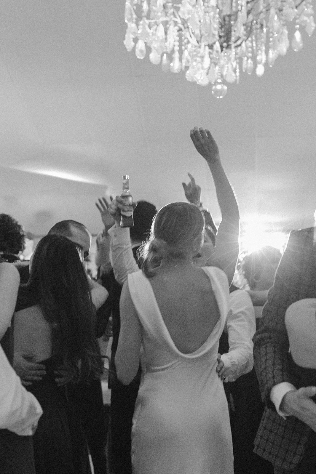 black and white picture of a bride and groom dancing at their Coachella valley wedding